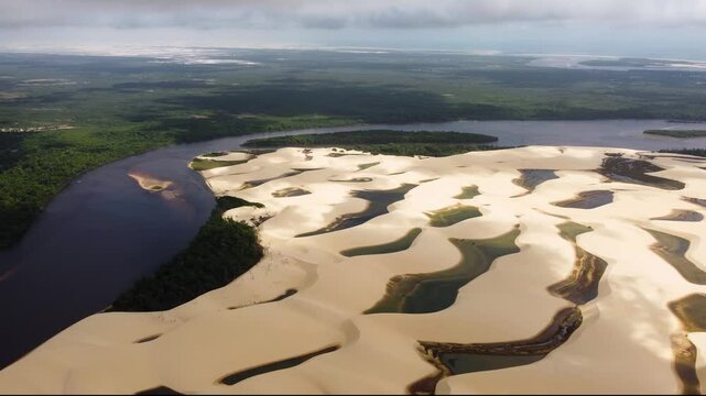 Mandacaru Village In Lencois Maranhenses Maranhao Brazil. Breathtaking Aerial View Of A Lush Tropical Coastline Scenery. Idyllic Falls Flowing Water Beautiful Day. Flowing Water.