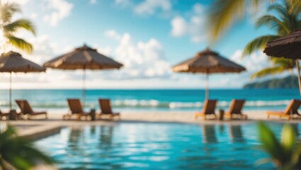Fototapeta premium A tropical beach scene showing lounge chairs and umbrellas by the water, with palm trees and a blue sky with clouds.