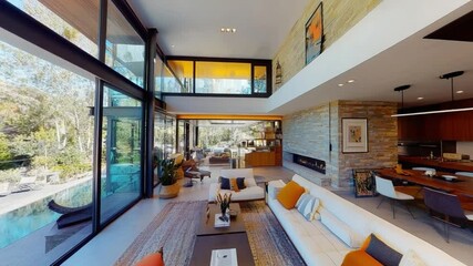 Spacious Living Room with Panoramic View: A luxurious modern interior of a living room showcasing stunning panoramic views, blending indoor comfort with outdoor serenity.