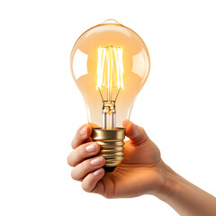A hand holding a glowing light bulb with a black background in the studio