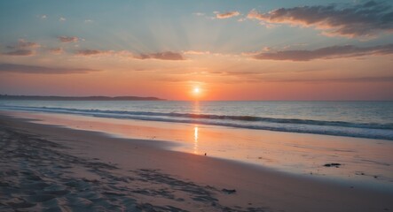 Sunset over the ocean with clouds and waves on a beach at dusk. Peaceful and serene seaside landscape.