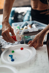 Preparing paint for painting close up