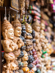 Fototapeta premium Handcrafted Buddha Statues at a Local Market A Cultural Showcase of Artisan Crafts