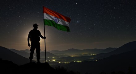 Silhouette of a Person Holding the Indian Flag Under a Starry Night Sky Over Mountain Landscape
