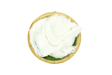 Thai Fermented Rice Flour Noodles or Rice Vermicelli, Khanom Jeen in Thai, with green banana leaf in basket isolated on white background top view flat lay with clipping path stacking