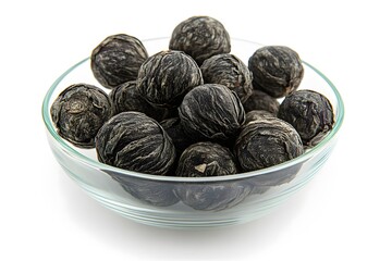 Dark Tea Balls in Glass Bowl Close Up Photography
