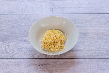 Noodles are made from rice flour, wheat flour, and eggs. They are white and yellow.