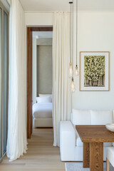 Fototapeta premium Cozy and modern living space with natural light and elegant decor in a contemporary home