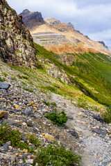 Hiking trail to Plain of Six Glaciers. Narrow path in the mountains. The Rocky Mountains. Banff National Park, Alberta, Canada