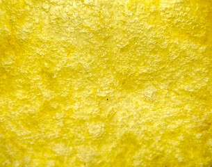 close up of yellow potato chips textured