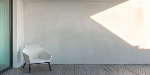 Modern chair positioned against a minimalist wall in bright natural light