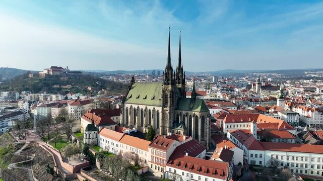 Brno, Czechia. Active Roman Catholic cathedral.  Originally medieval in gothic style, then many renovations, High towers added in Gothic revival between 1901-1909. Aerial view
