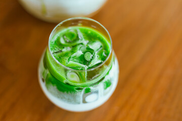 iced matcha latte tea with milk..
