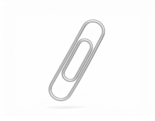 A sleek silver paperclip stands out against a clean white background, showcasing its design.