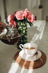 cup of coffee with flowers