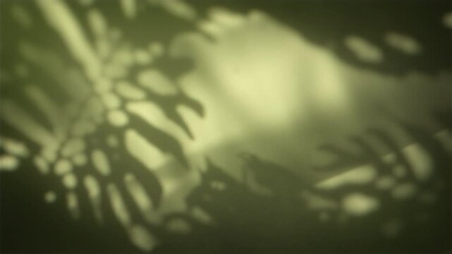 4K Seamless loop of tropical leaf shadows moving softly on green background, natural light overlay, botanical texture, animation background, graphic design element, nature-inspired digital asset