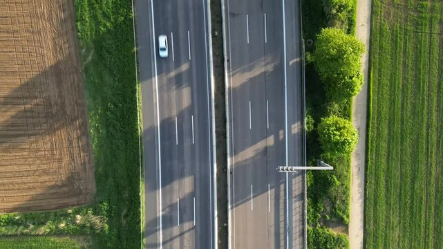 Flying down the highway with the moderate traffic in the evening 