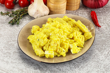 Italian cuisine - yellow risotto with chicken