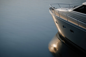 premium yacht featuring sleek minimalist design bathed in soft ambient lighting