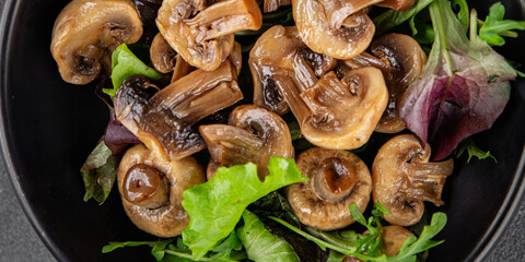 Mushrooms pickled champignon salad snack fresh delicious gourmet food background on the table rustic food top view copy space keto and paleo diet vegetarian and vegan food
