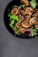 Mushrooms pickled champignon salad snack fresh delicious gourmet food background on the table rustic food top view copy space keto and paleo diet vegetarian and vegan food