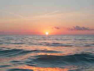 Obraz premium Serene Sunset Over the Ocean Reflective Waves and Warm Pastel Colors Filling the Sky
