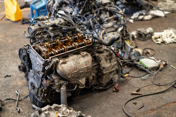 Fototapeta na wymiar old car engine block open cover under service maintenance, repair internal fix camshaft cylinder head area