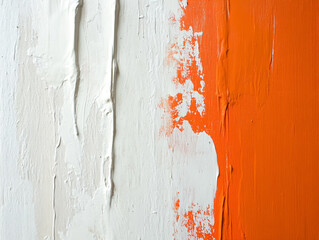 Close-up of a vertical wall, featuring a white and orange color palette, created with acrylic paint.
