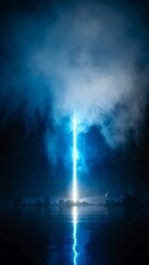 Mystical blue light beam over dark water and rocks