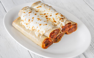 Oven-Baked Cannelloni Stuffed with Savory Bolognese and Covered in Golden Mozzarella