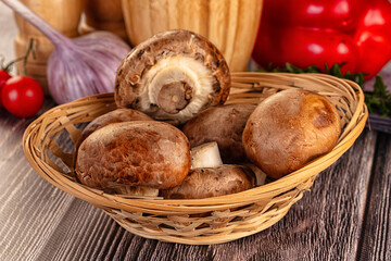 Raw brown champignon heap for cooking
