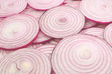 Onion slices as a background. Top view.