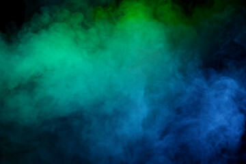 Blue and green steam on a black background.