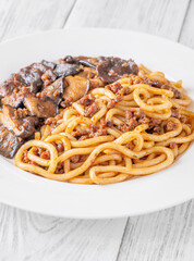 Unagi udon noodles served with beef and crispy garlic thyme shiitake