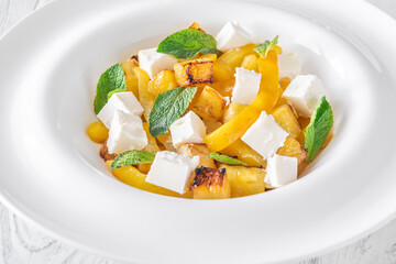 Colorful Salad With Feta, Grilled Peppers, Pineapple And Fresh Mint Leaves