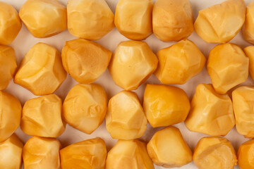 Piece of cheese isolated on white bacckground.