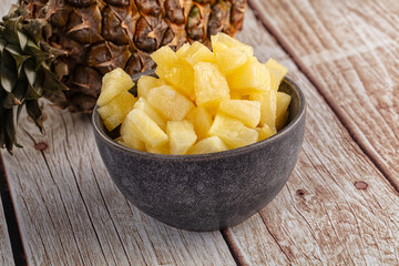 Sweet canned pineapple fruit pieces