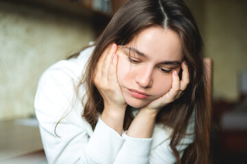 Portrait of a sad teenager experiencing teenage failures