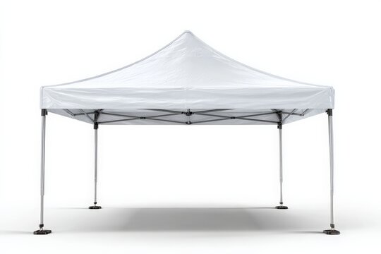 White canopy tent set up for outdoor events in a sunny park during the afternoon
