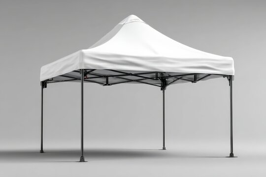 Large white pop-up canopy tent set up for outdoor events and gatherings in a neutral studio setting