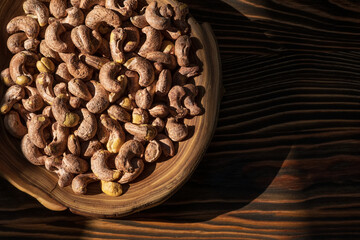 Cashews in Wooden Bowl and Background