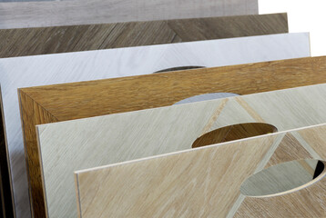 Laminate background. Samples of laminate or parquet with a pattern and wood texture for flooring and interior design. Production of wooden floors.. 