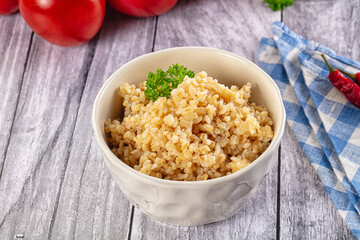 Vegan cuisine - boiled bulgur garnish