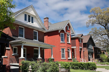 street with old brick houses with gables