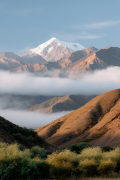 aconcagua mountain shrouded in morning fog creating mystical atmosphere
