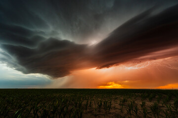 Powerful bolts of lightning flash through spectacular storm clouds, lighting up a dramatic sky filled with shadow, texture, and moody atmosphere, showcasing nature's epic beauty and raw power.