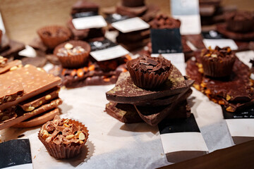 Indulgent chocolate delicacies displayed in a confectionery shop during the afternoon