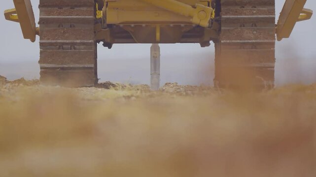 Bulldozer Starts Working with Soil
