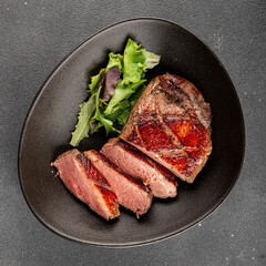 Duck breast roast meat poultry fresh delicious gourmet food background on the table rustic food top view copy space