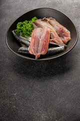 Sardine raw fish fillet seafood anchovy filet fresh delicious gourmet food background on the table rustic food top view copy space pescetarian diet